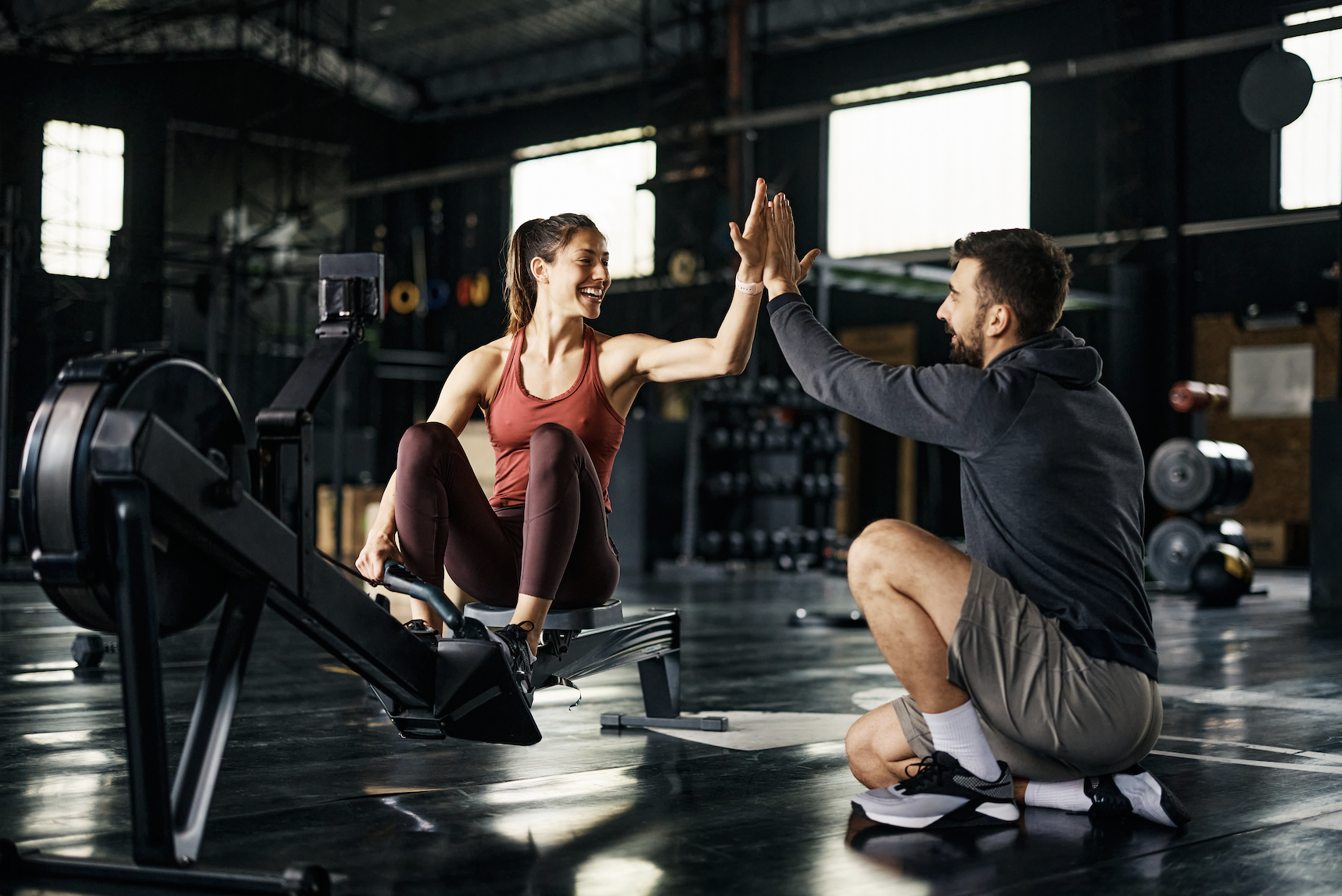 Cours de sport entre coach sportif et élève